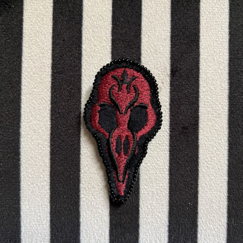 Broche Crane de corbeau Rouge/Noir